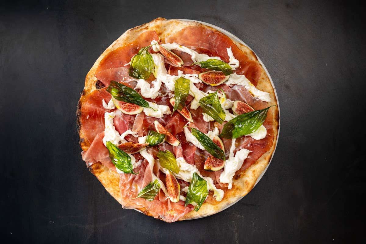 Giomà, con la pizza tonda la nuova vita di un'insegna storica al Tuscolano